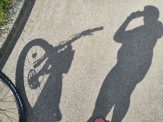 Schattenbild Mensch und Fahrrad