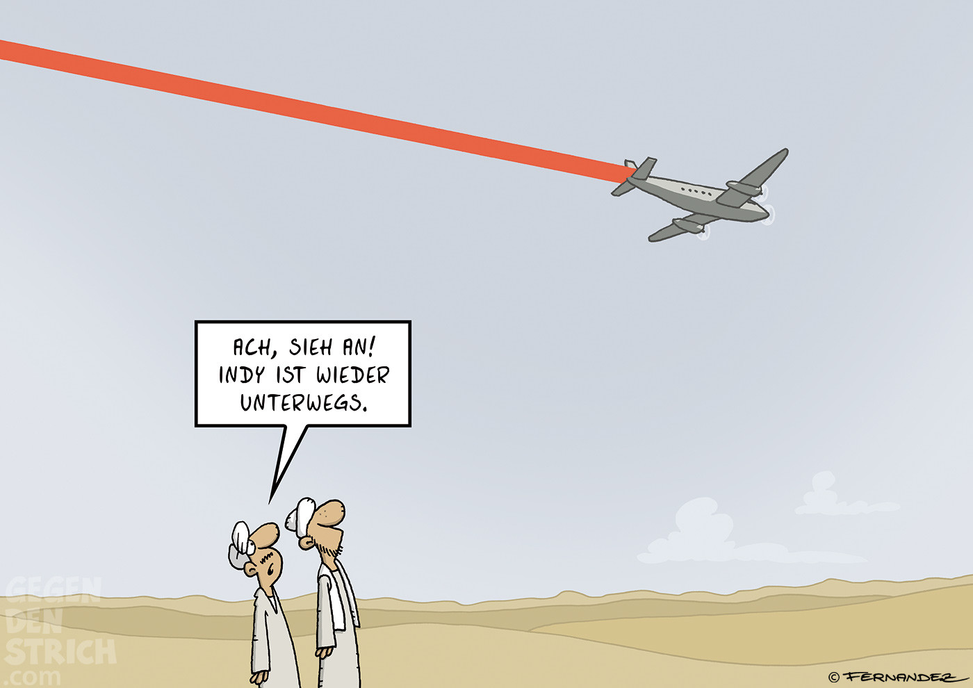 Zwei Männer in der Wüste blicken in den Himmel. Ein Propellerflugzeug fliegt vorbei, hinter sich eine dicke rote Linie. Einer der Männer sagt: „Ach, sieh an! Indy ist wieder unterwegs.“ – Eine Anspielung auf die Indiana Jones-Reiseszenen, in denen eine rote Linie die Route auf einer Karte markiert.