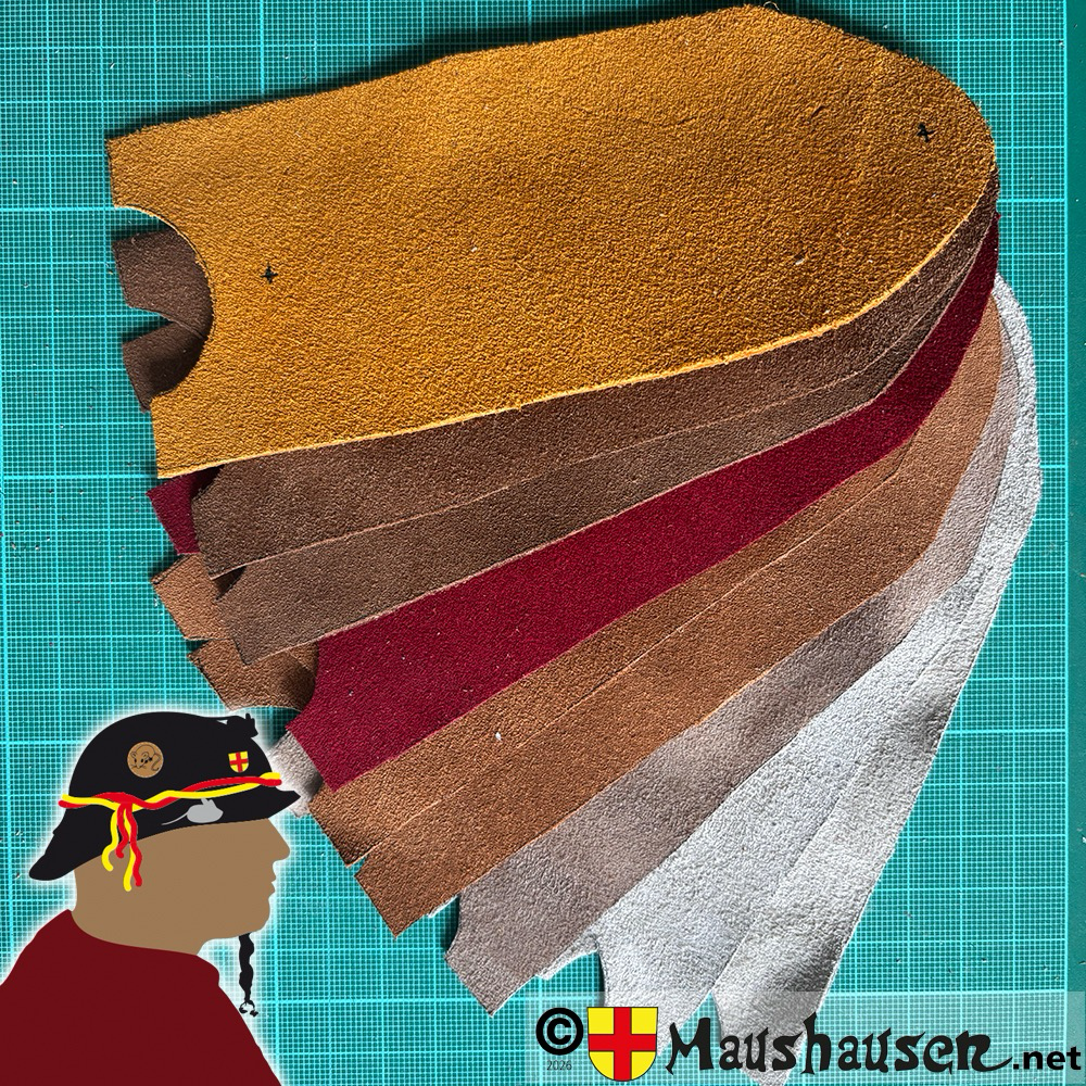 Zugeschnittene Lederstücke für die Münztäschchen in verschiedenen Farben